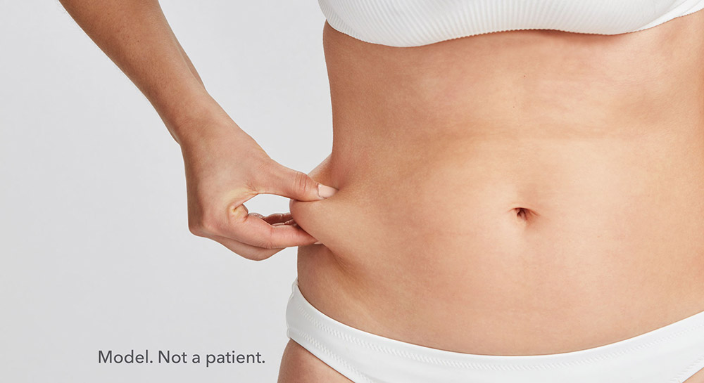 Pinching a stubborn pocket of abdominal fat